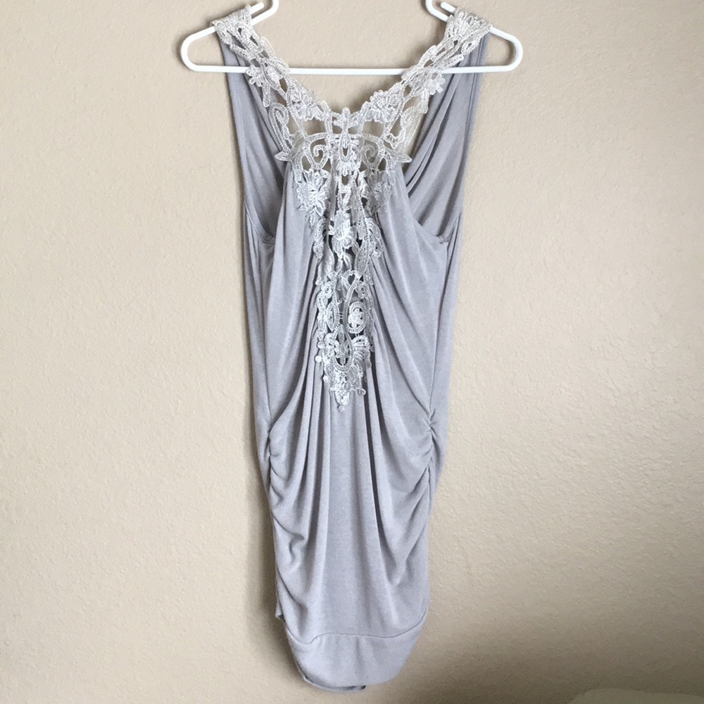 Woman’s Lacy Top. made by Rhapsody. Size medium
